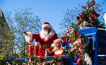 Santa Claus waving from a float