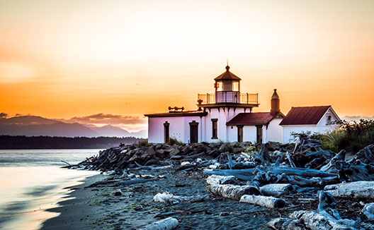 lighthouse during sunset at Discovery Park